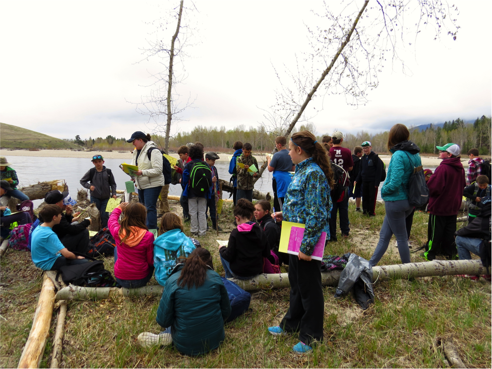 Students received instruction in geology and the history of the Bitterroot Valley. They discovered gneiss, granite, and quartzite stones and then skipped those stones into the river.